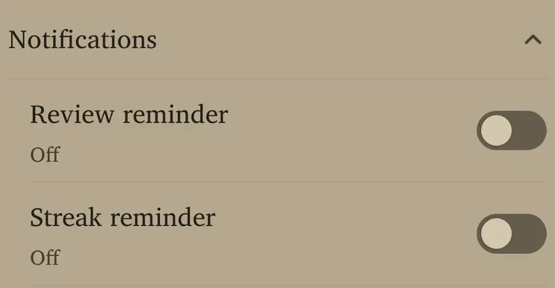 Notifications panel with separate Review reminder and Streak reminder switches